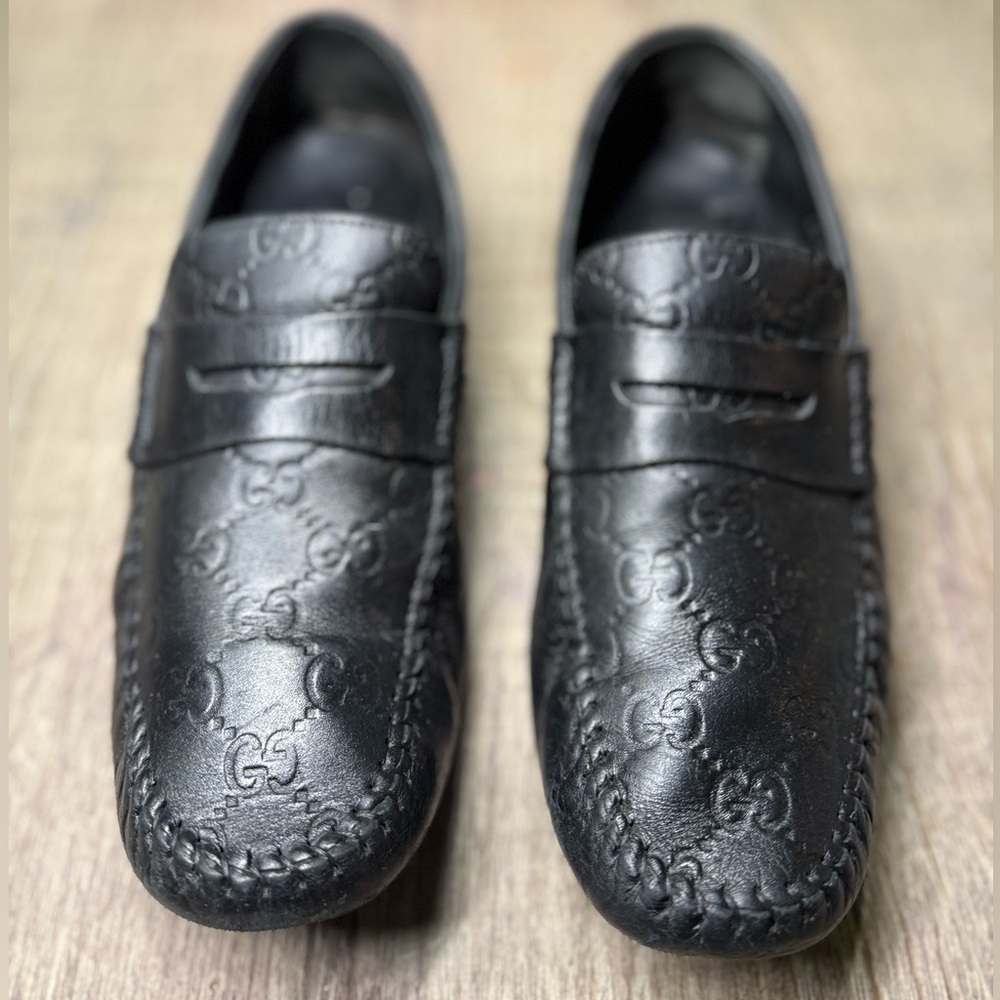 Gucci Black Loafers with Embossed Pattern